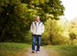 Senior walking for wellness on a cool day